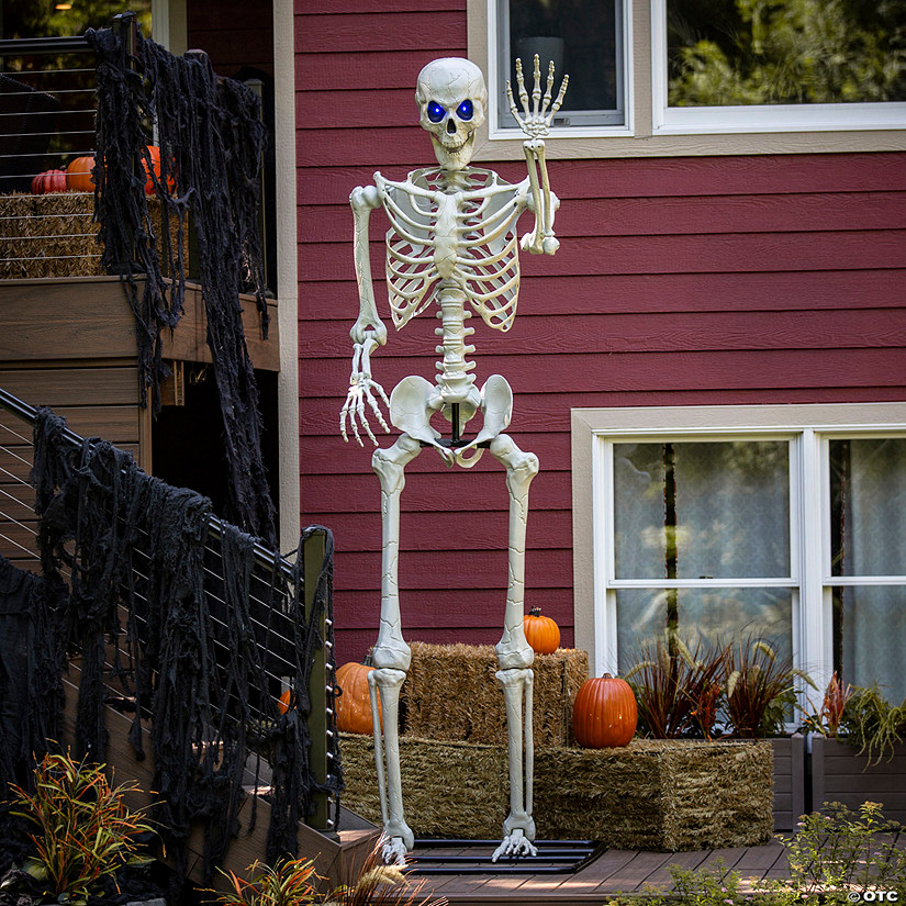 10 Ft. 5&quot; Standing Multicolor Light-Up Eyes Posable Titan Skeleton Halloween Decoration Image