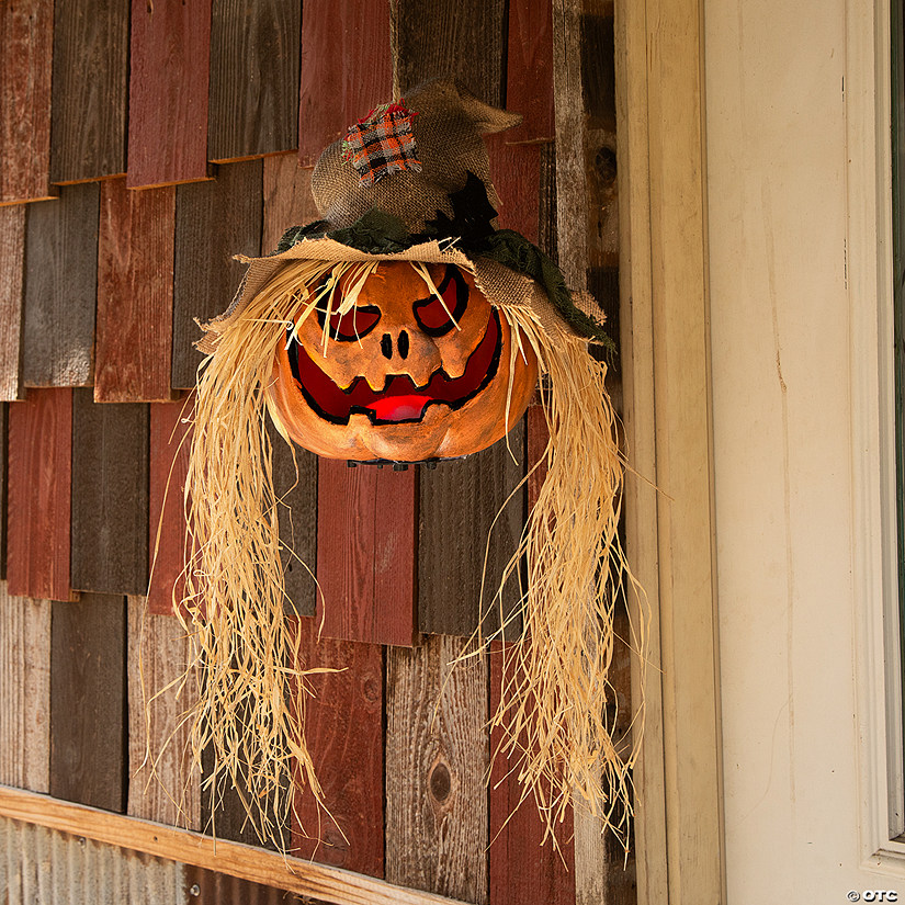 11 3/4" x 27 1/2" Hanging Pumpkin Head Plastic Halloween Decoration Image